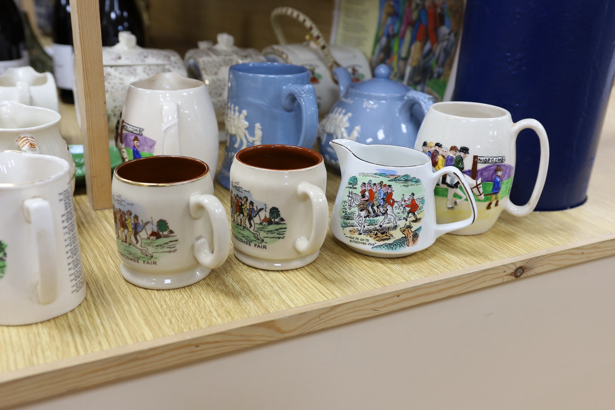 A quantity of novelty items relating to Widecombe Fair, to include jugs, teapots etc.